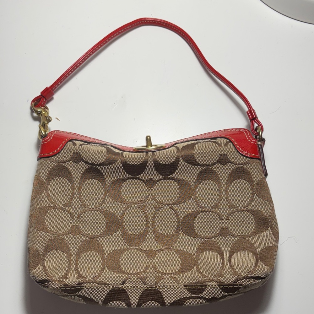 Coach Brown Signature Canvas Shoulder Bag with Red Trim